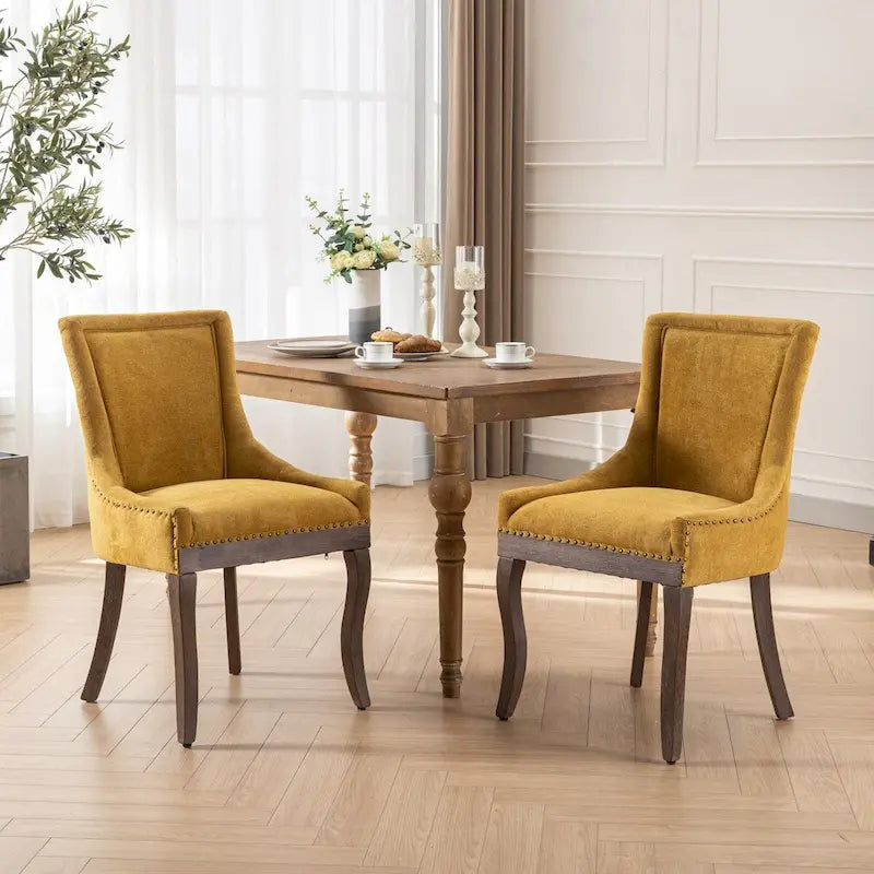 Ultra Side Dining ChairThickened fabric chairs with neutrally toned solid wood legs Bronze nail headSet of 2Blue