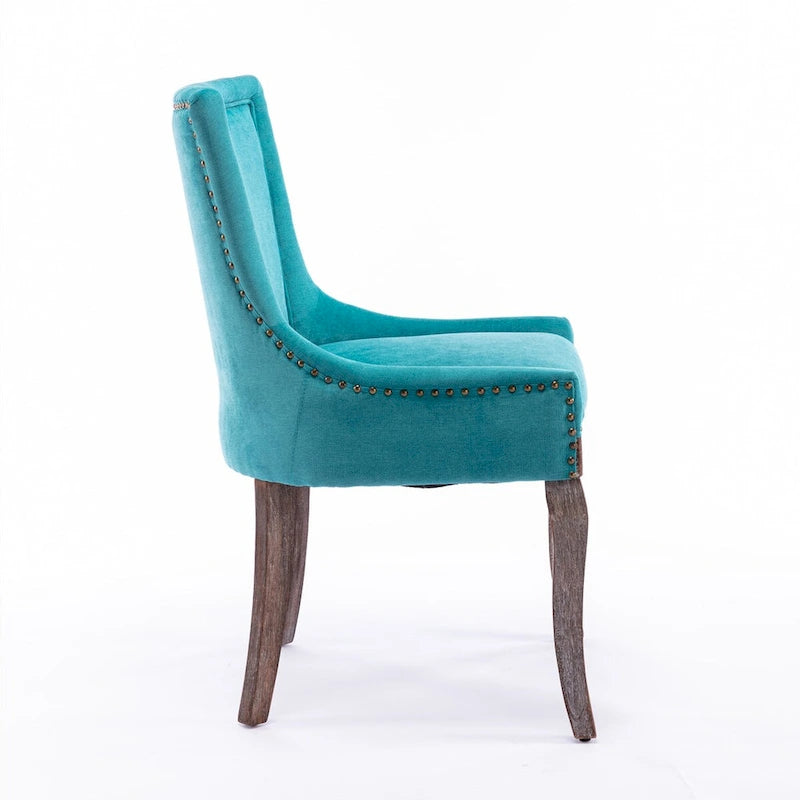 Ultra Side Dining ChairThickened fabric chairs with neutrally toned solid wood legs Bronze nail headSet of 2Blue